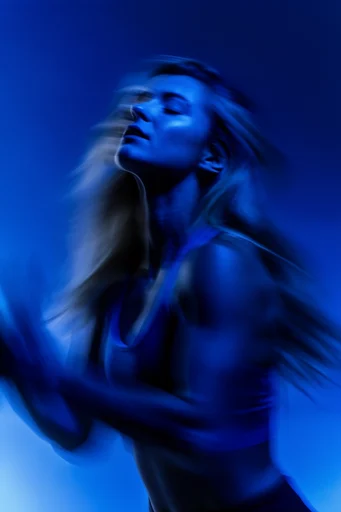 Kinetic Cobalt Motion style reference image — high contrast