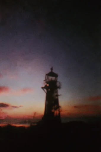 Nostalgic Analog Introspection style reference image — low-key moody shadows