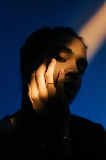 Cinematic Neo-Noir Chiaroscuro style reference image — cobalt blue atmosphere