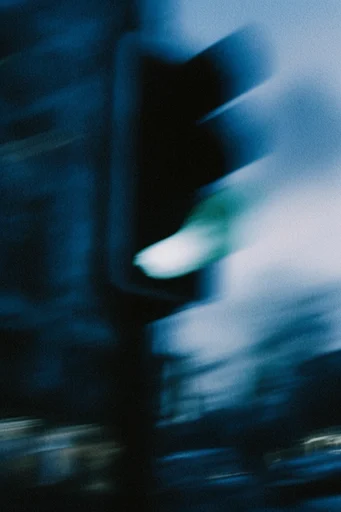 Spectral Nocturnal Motion style reference image — high-contrast darkness