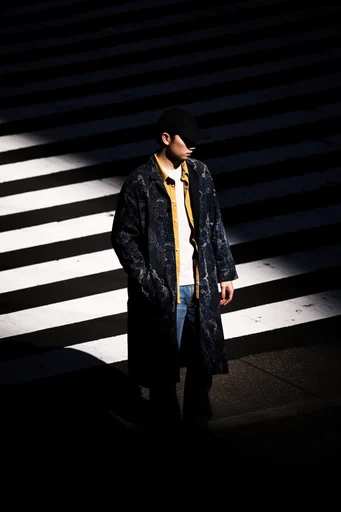 Cinematic Urban Chiaroscuro style reference image — minimalist urban composition