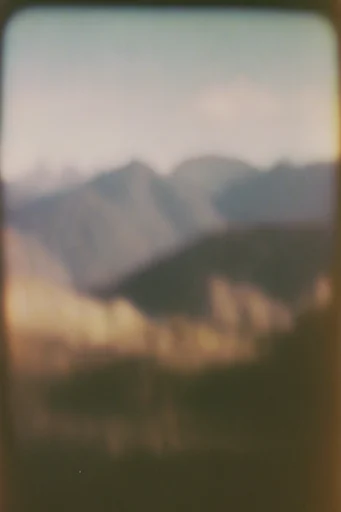 Nostalgic Liminal Impressionism style reference image — analog film grain