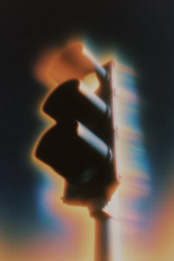Ethereal Luminous Distortion style reference image — heavy film grain texture