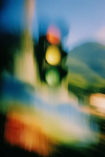Luminous Motion Impressionism style reference image — heavy analog film grain