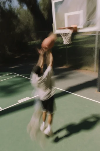 Kinetic Minimalist Athletics style reference image — motion blur photography