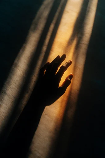 Cinematic Amber Chiaroscuro style reference image — high-angle composition