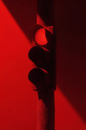 Crimson Chiaroscuro Noir style reference image — saturated crimson red