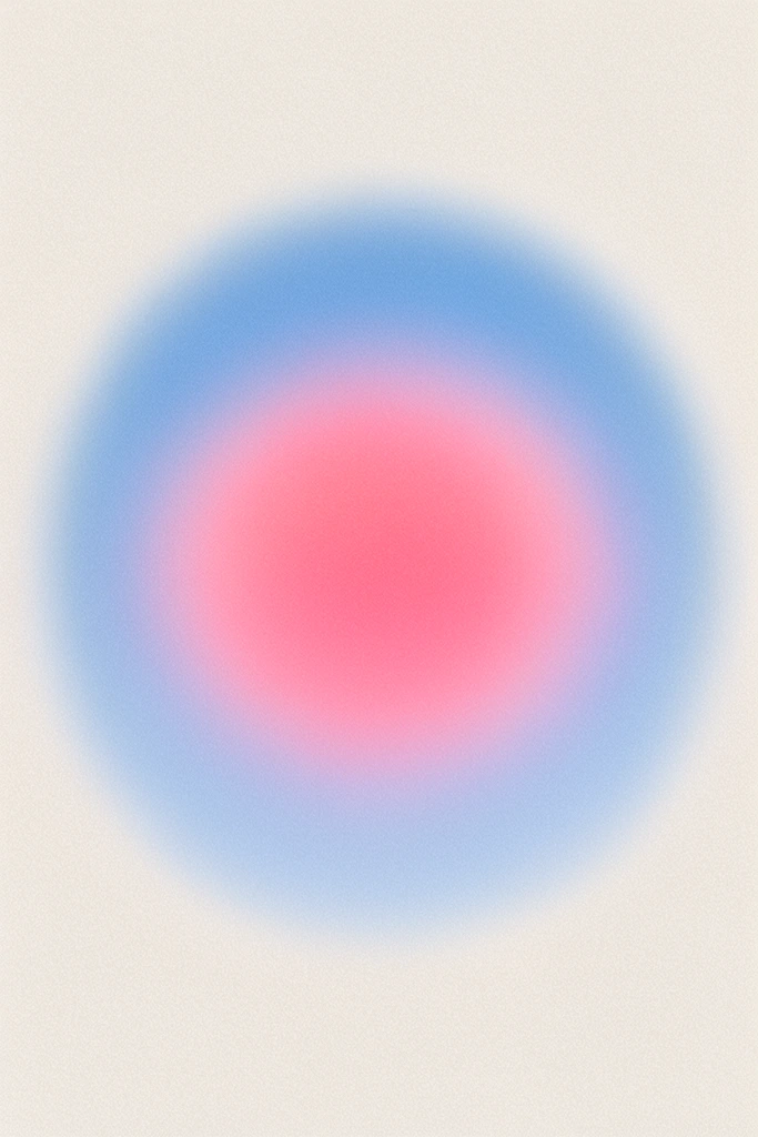 A soft, diffused circular aura centered on a textured off-white background. The ethereal gradient transitions smoothly from a vibrant, warm pink core to a hazy, pale sky-blue outer ring. A pronounced, uniform film grain texture covers the entire composition, lending a tactile, lo-fi printed aesthetic to the minimalist, abstract color field, creating a soothing and meditative visual.