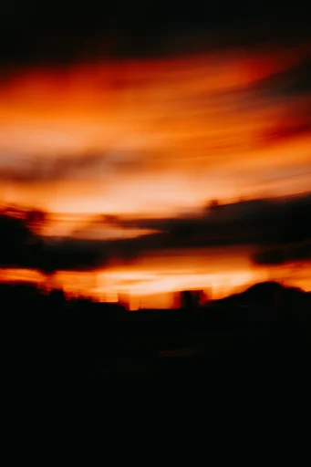 Ethereal Kinetic Nocturne style reference image — horizontal motion blur