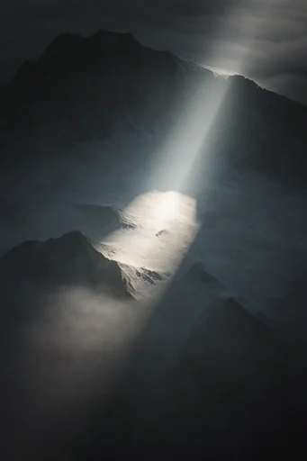 Monolithic Chiaroscuro Minimalism style reference image — brutalist minimalism