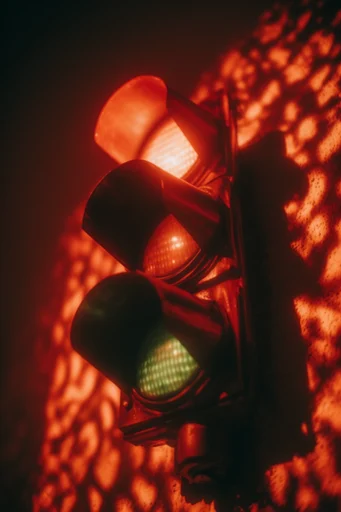 Cinematic Amber Noir style reference image — dramatic shadow patterns