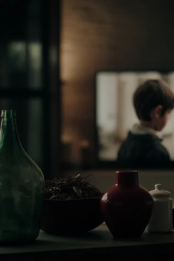 Cinematic Analog Suspense style reference image — low-key moody lighting