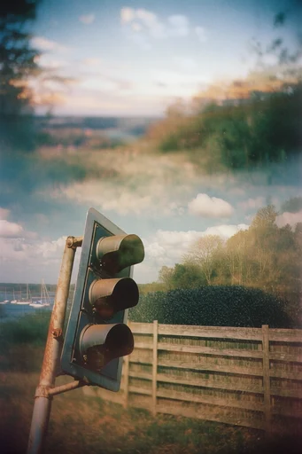 Ethereal Analog Surrealism style reference image — analog film grain