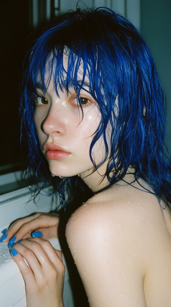 close-up portrait, young woman with wet cobalt blue hair looking over bare shoulder, pale glossy skin with water droplets, blue fingernails on white ledge, direct flash photography, deep shadows, raw candid film aesthetic