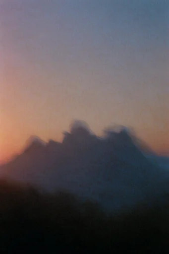 Ethereal Nostalgic Haze style reference image — heavy film grain