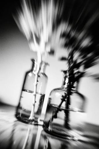 Monochrome Kinetic Vertigo style reference image — cinematic film grain