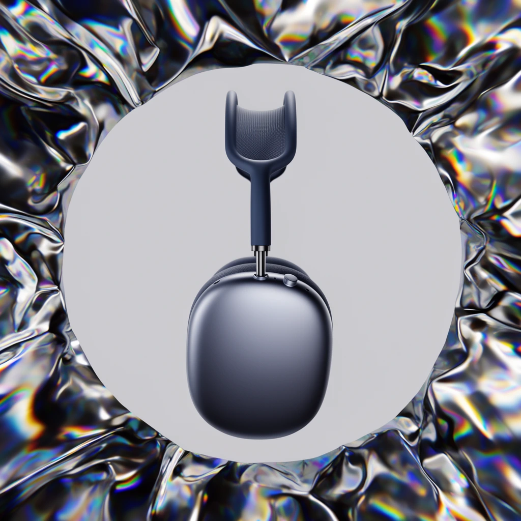 A gunmetal-grey over-ear headphone floats in a flat, light-grey circle, framed by undulating iridescent liquid metal. Viewed in profile, the device features a smooth domed earcup, a dark cushion, and a curved headband. The stark geometric central void sharply contrasts with the deeply creased, highly reflective metallic foil border. This organic exterior exhibits spectral holographic flares of rainbow chromatic aberration along its sharp ridges. The composition blends realistic product rendering with an abstract material study, contrasting the pristine matte subject against chaotic chromatic reflections.