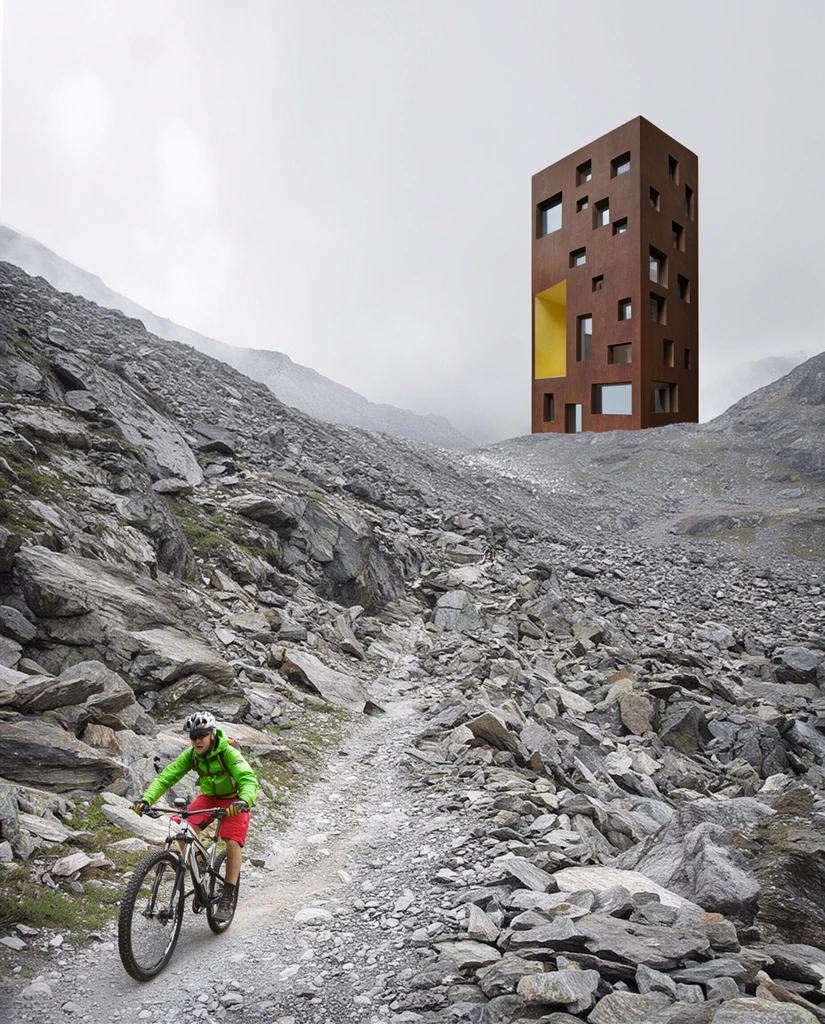 mountain biker in a neon green jacket and red shorts riding up a steep rocky alpine trail, surrounded by jagged grey stones and scree, tall rectangular modern building perched on a distant high ridge, rusty brown building facade with scattered irregular square windows and a recessed yellow alcove, geometric architecture contrasting with rugged nature, overcast hazy sky, wide landscape composition, photorealistic architectural composite, muted grey palette with vibrant color accents