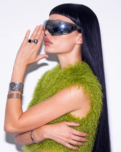 Green fur and chrome sunglasses editorial